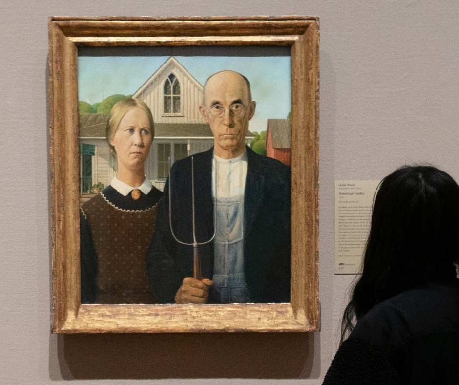 Woman Looks At American Gothic Painting Woman Looks At American Gothic Painting