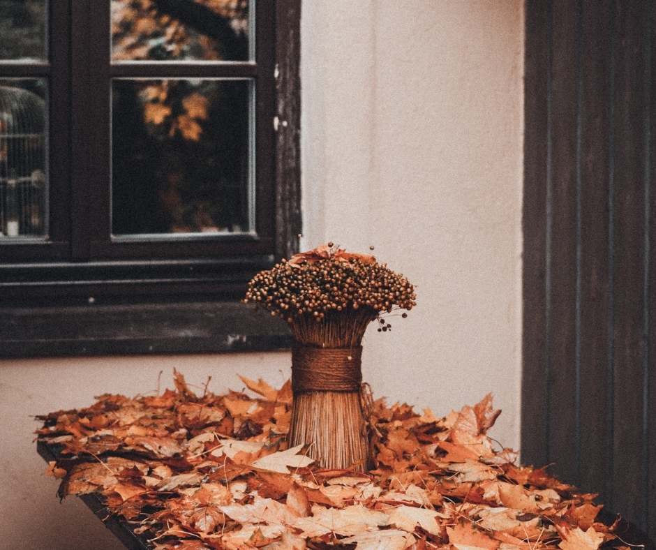 Fall Decorations & Dried Leaves On Table Fall Decorations & Dried Leaves On Table