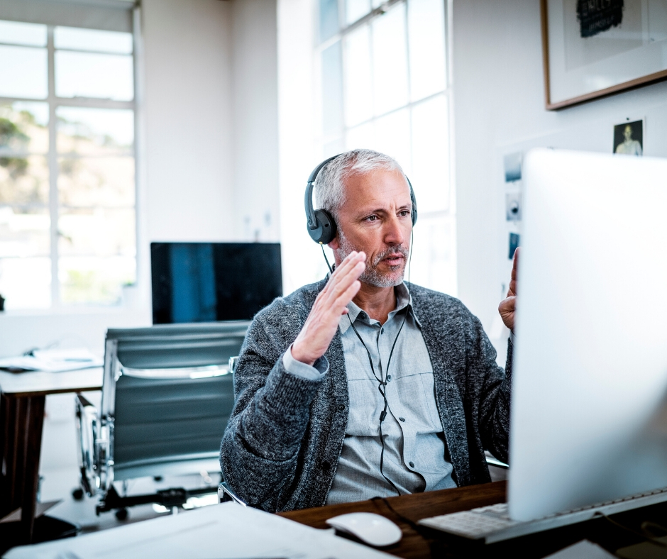 Man In Headphones On Computer Man In Headphones On Computer